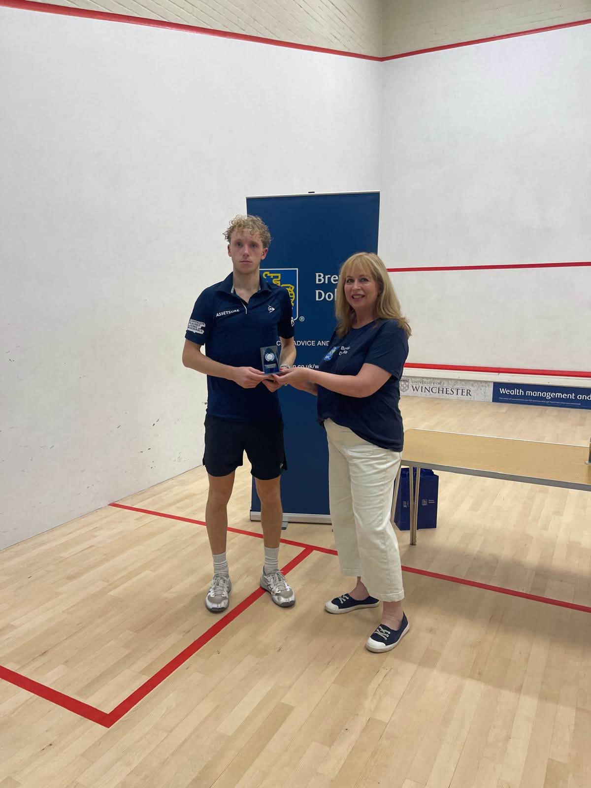 Dylan Roberts receiving the Excalibur Cup 2026 runner-up trophy
