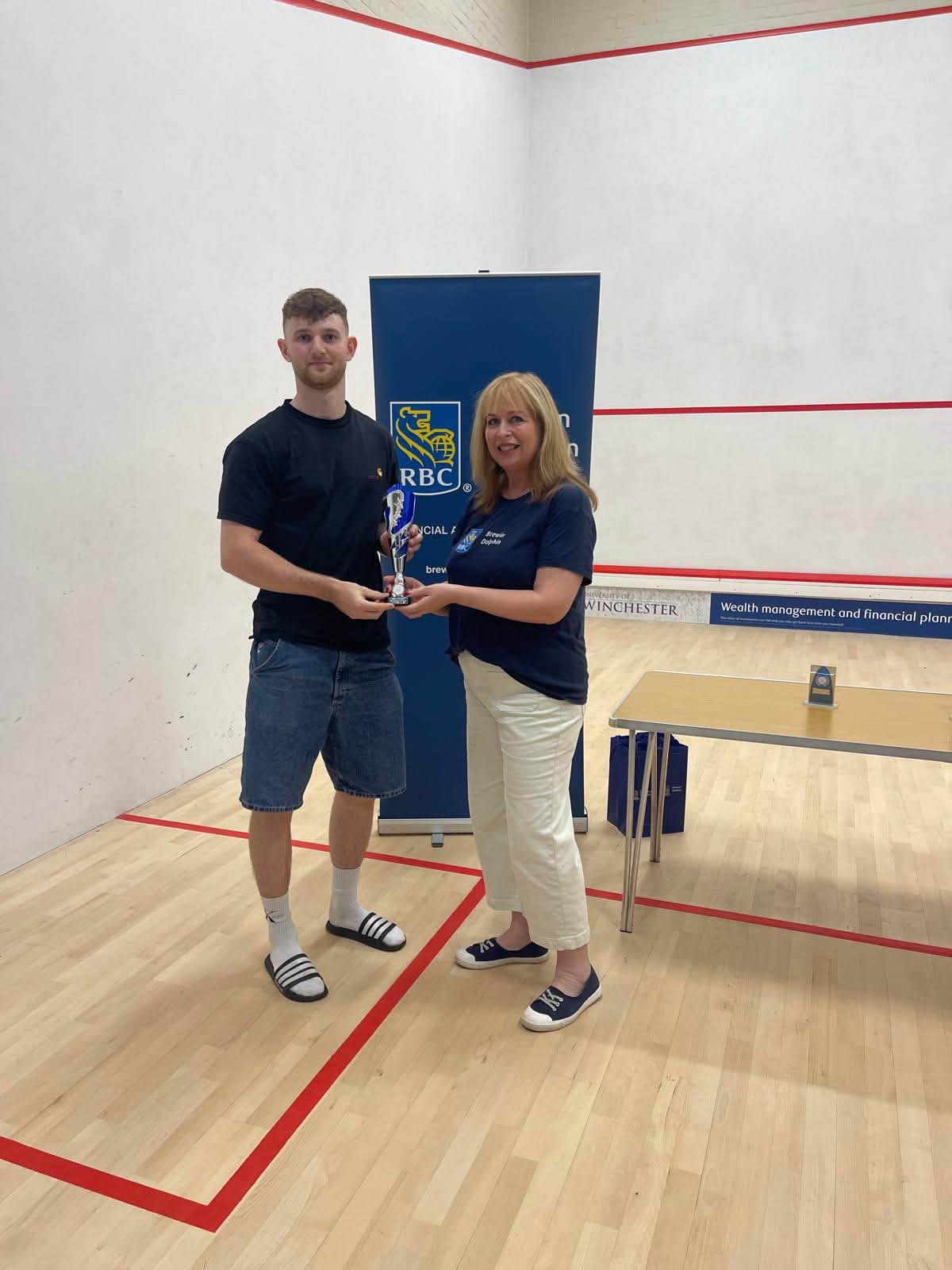 Jack Mascall receiving the B Grade winner's trophy