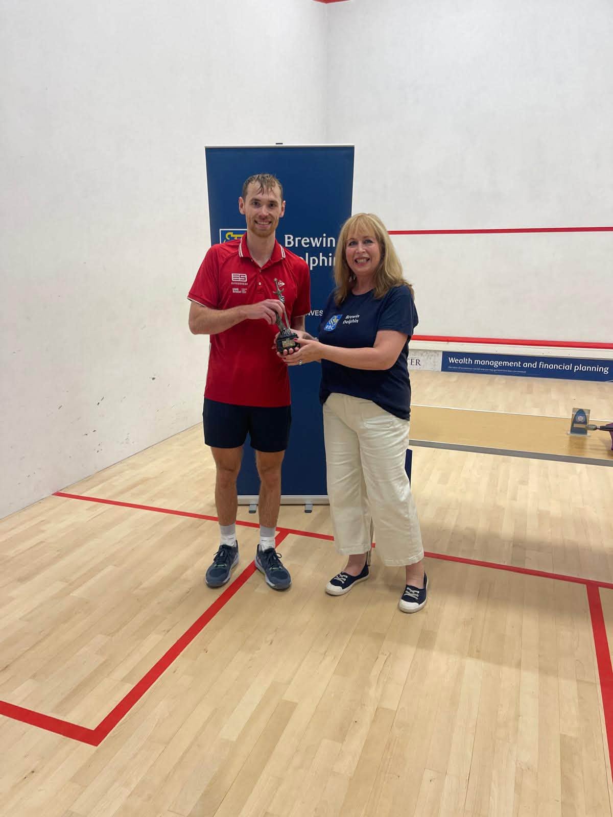 Jared Carter receiving the Excalibur Cup 2026 winner's trophy