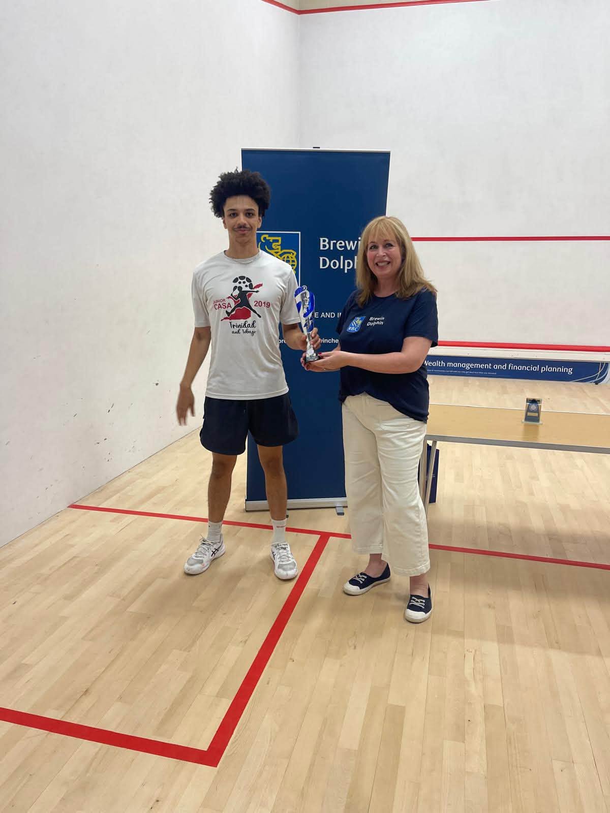 Shadow Lilco receiving the A Grade winner's trophy